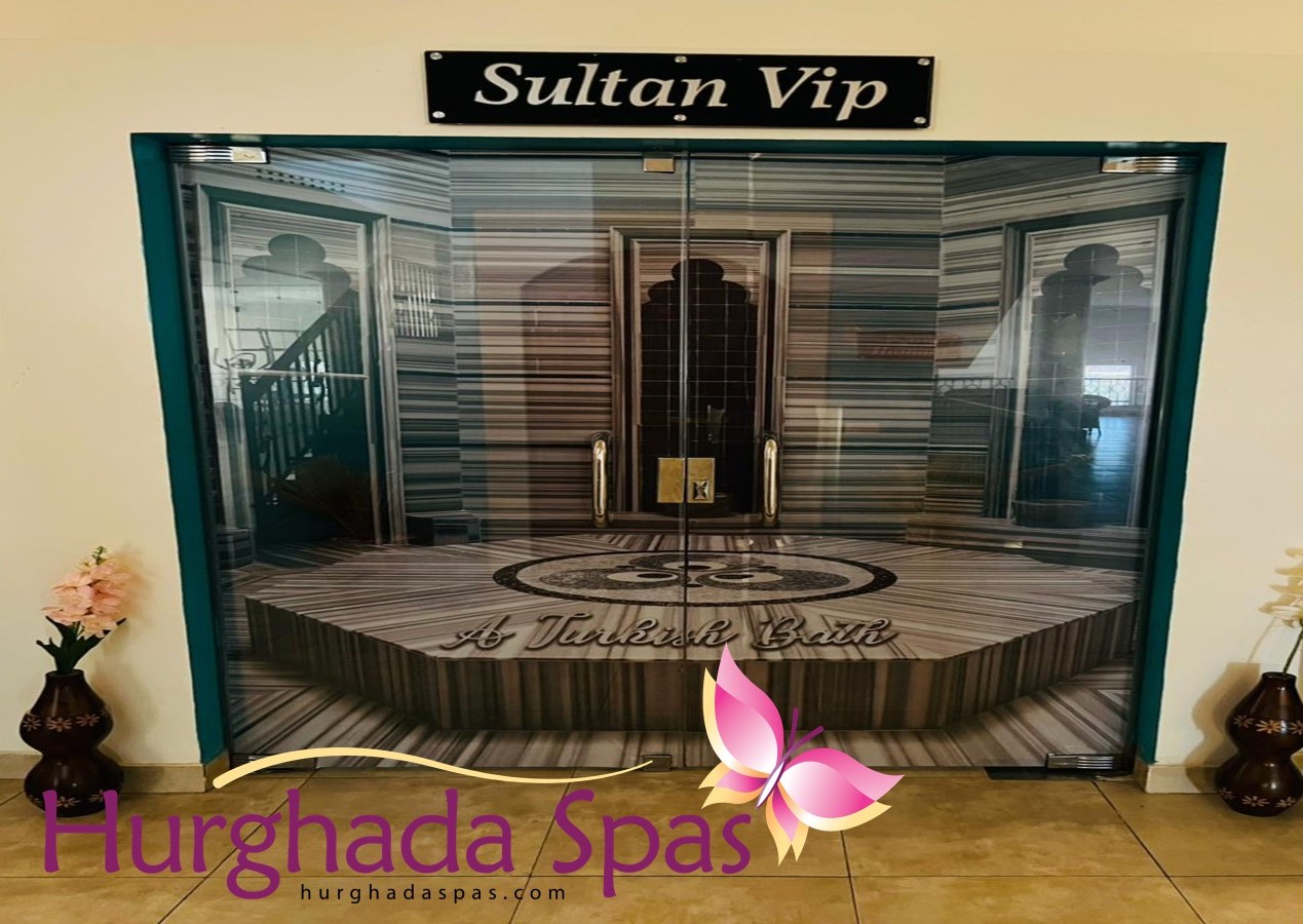 Luxurious entrance to the Sultan Spa Turkish Bath featuring traditional marble architecture and a heated Göbek Taşı.