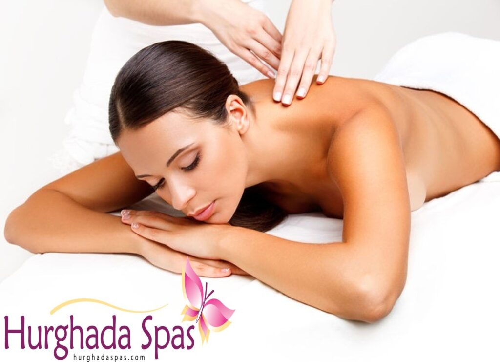 A professional therapist performing a deep tissue Sports Massage at Egyptos Spa to help a client with muscle recovery.