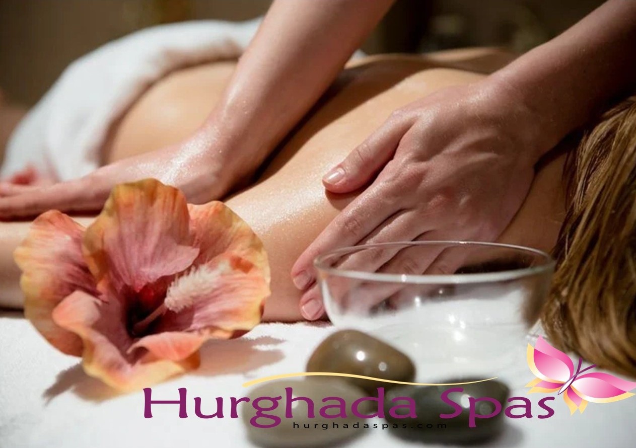 A woman enjoying a relaxing back massage with oils at Hurghada Spas, illustrating why you should book a hammam on day 1 of your Egypt vacation.