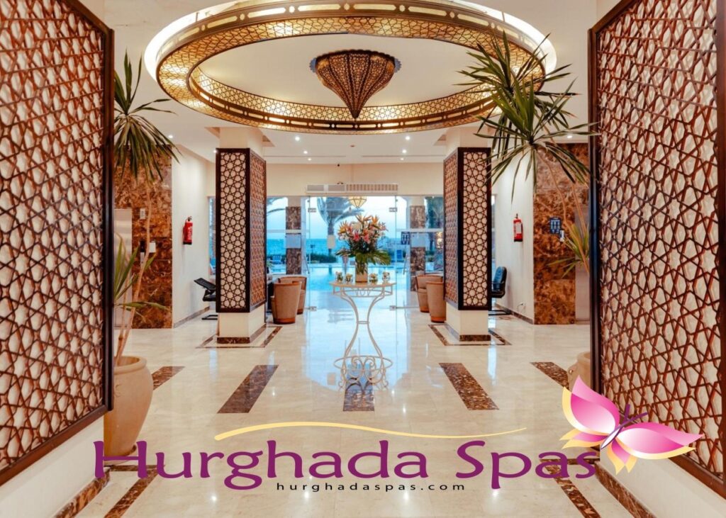 Elegant lobby with intricate wooden screens leading to the pool at Royal Resort Hurghada Guide: Ultimate Red Sea Escape