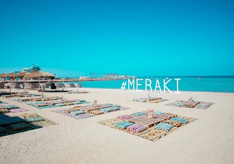 Outdoor beach lounge seating at Meraki Resort Hurghada for Meraki Resort Excursions Spa packages.