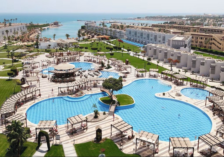 SUNRISE Crystal Bay Resort excursions & spa view of pools and beach in Hurghada